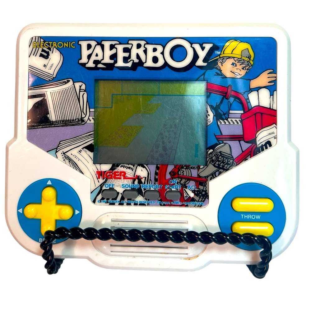 Vintage 1988 Handheld Electronic Paperboy Game by Tiger.  Working Condition.